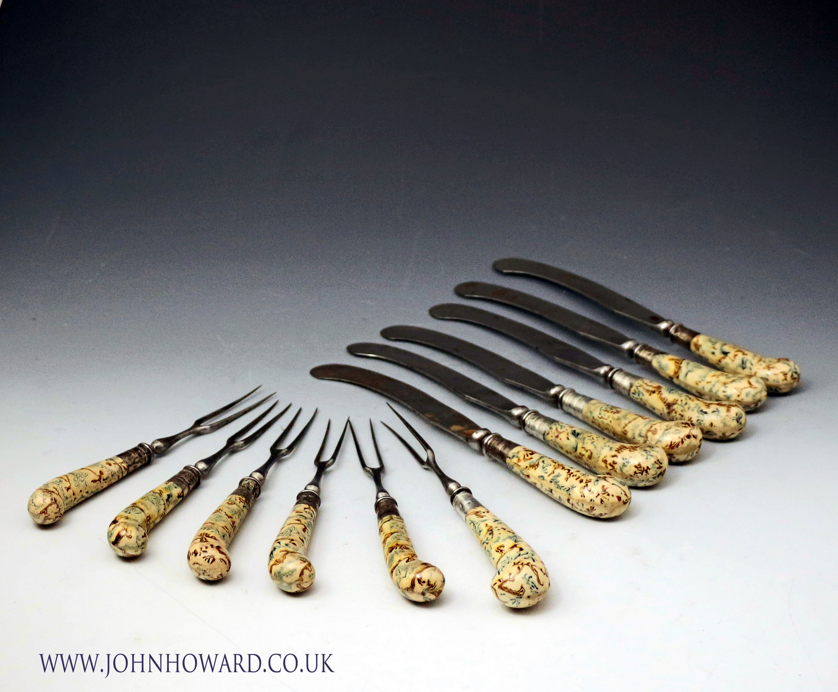 Whieldon type pottery knives and forks in agateware mid 18th century England