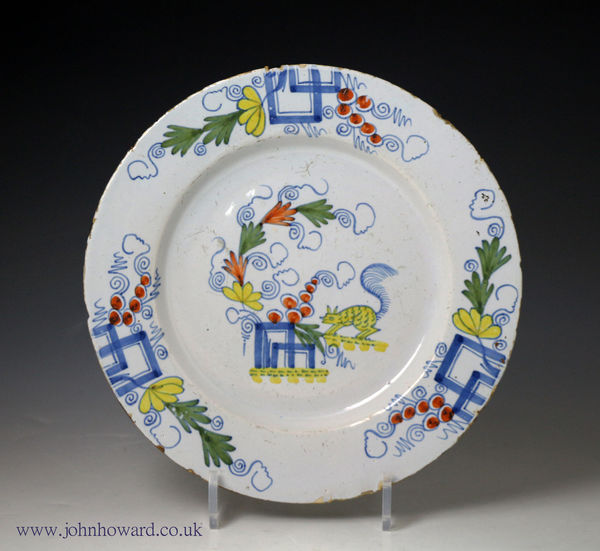 English delftware plate polychrome coloured with image of a squirrell mid 18th century