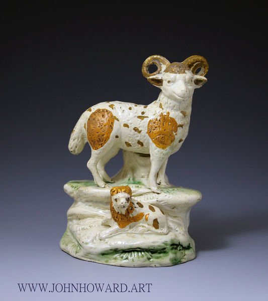 Antique English pottery figure of a ram with a lion, late 18th century