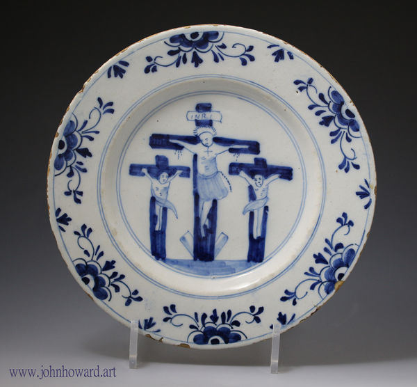 Antique period Delftware pottery plate depicting the Crucifixion, painted in blue and white early 18thc