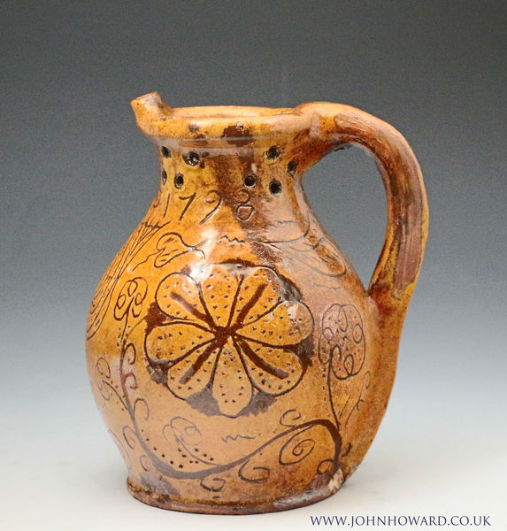 English pottery puzzle jug scraffito decorated and dated 1798 with initials SW