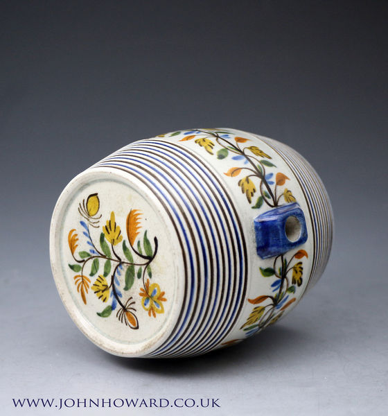 English pottery prattware barrell decorated with flowers and foliage in Pratt colours. circa 1810 Bristol Pottery England