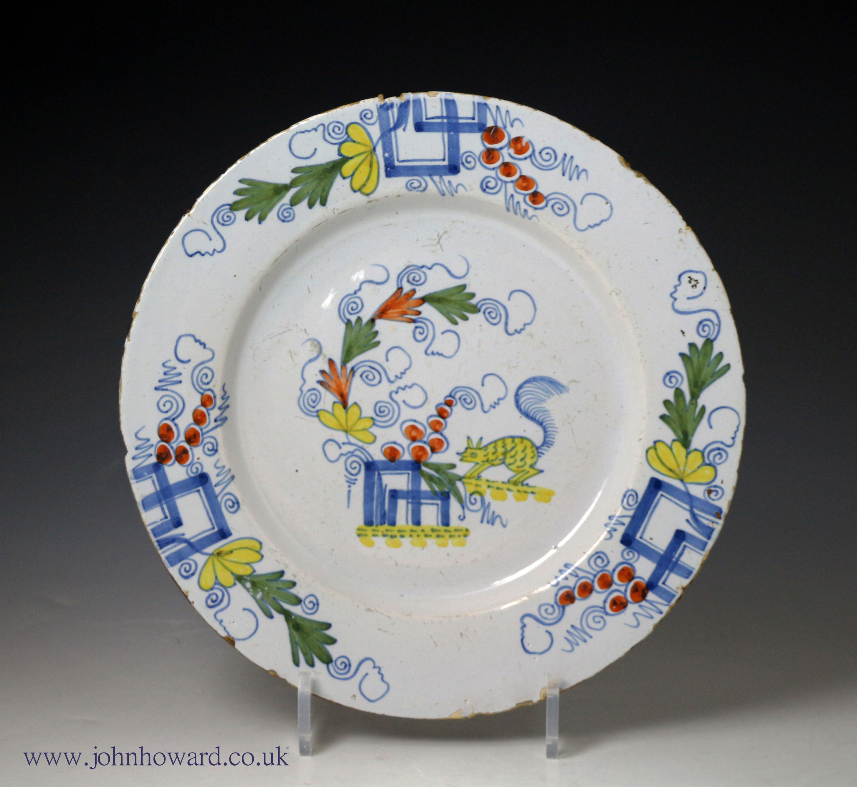 English delftware plate polychrome coloured with image of a squirrell mid 18th century