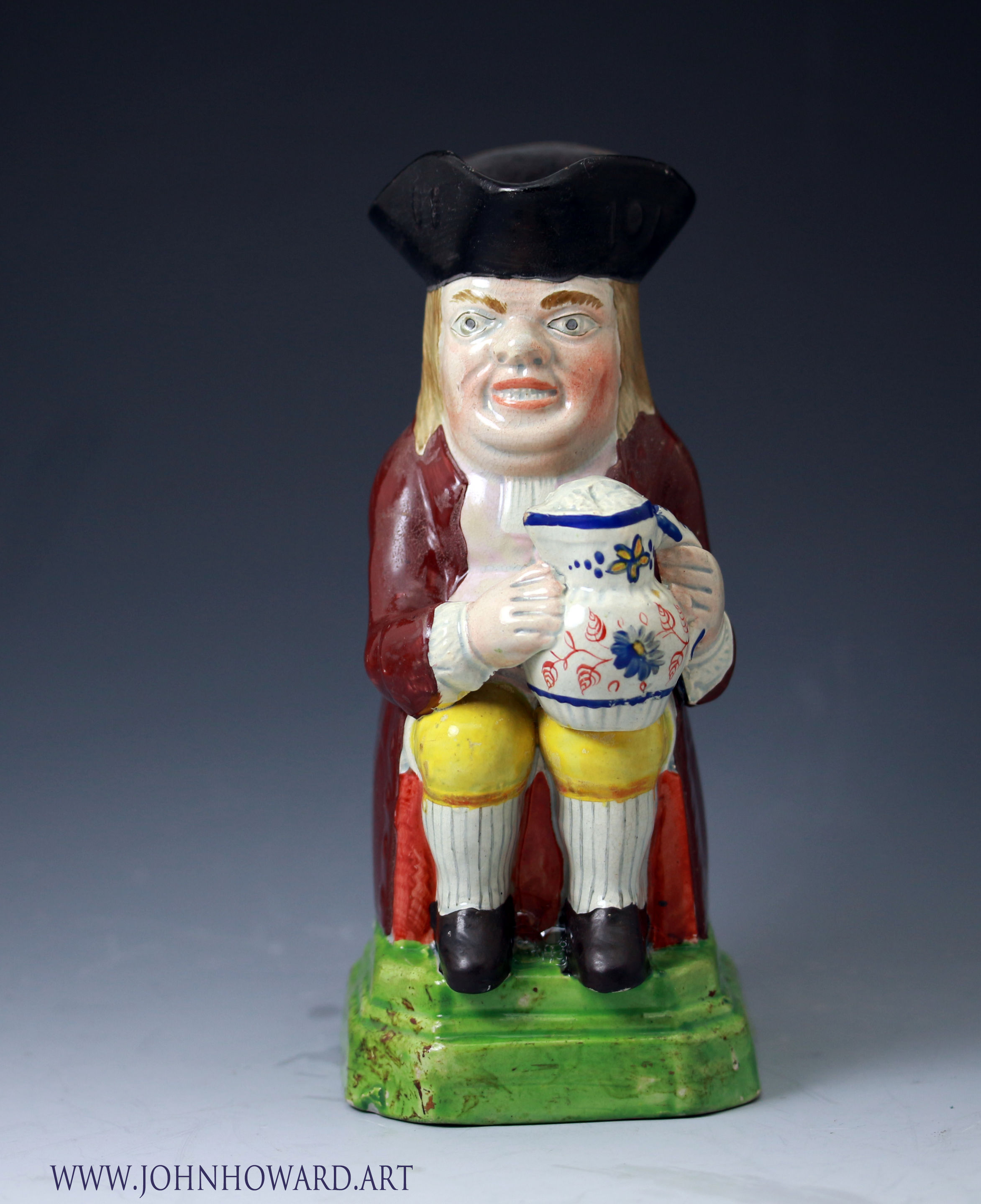 Antique English pottery toby jug , Staffordshire early 19th century