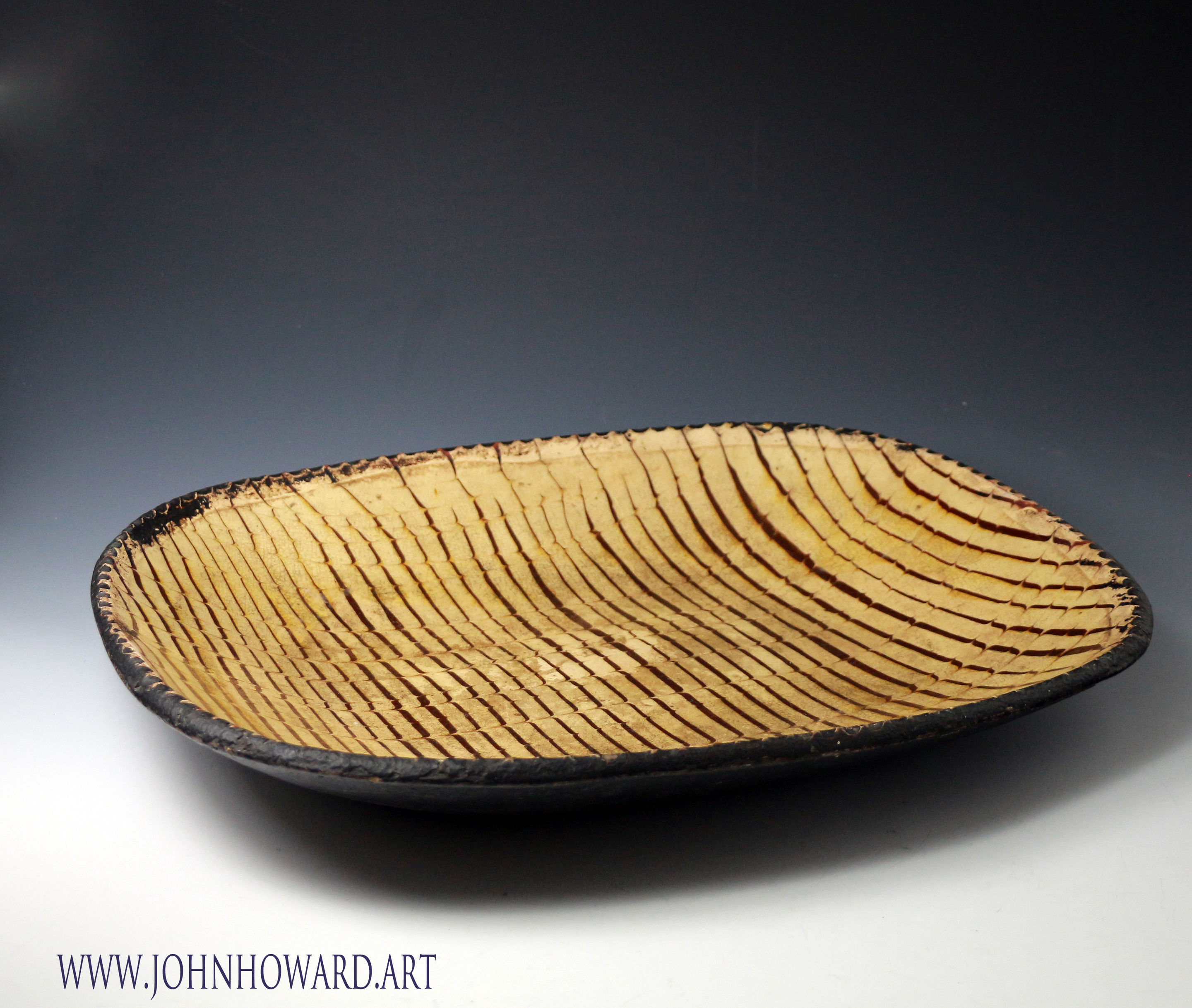 English slipware comb decorated baking or loaf dish, earthenware late 18th century