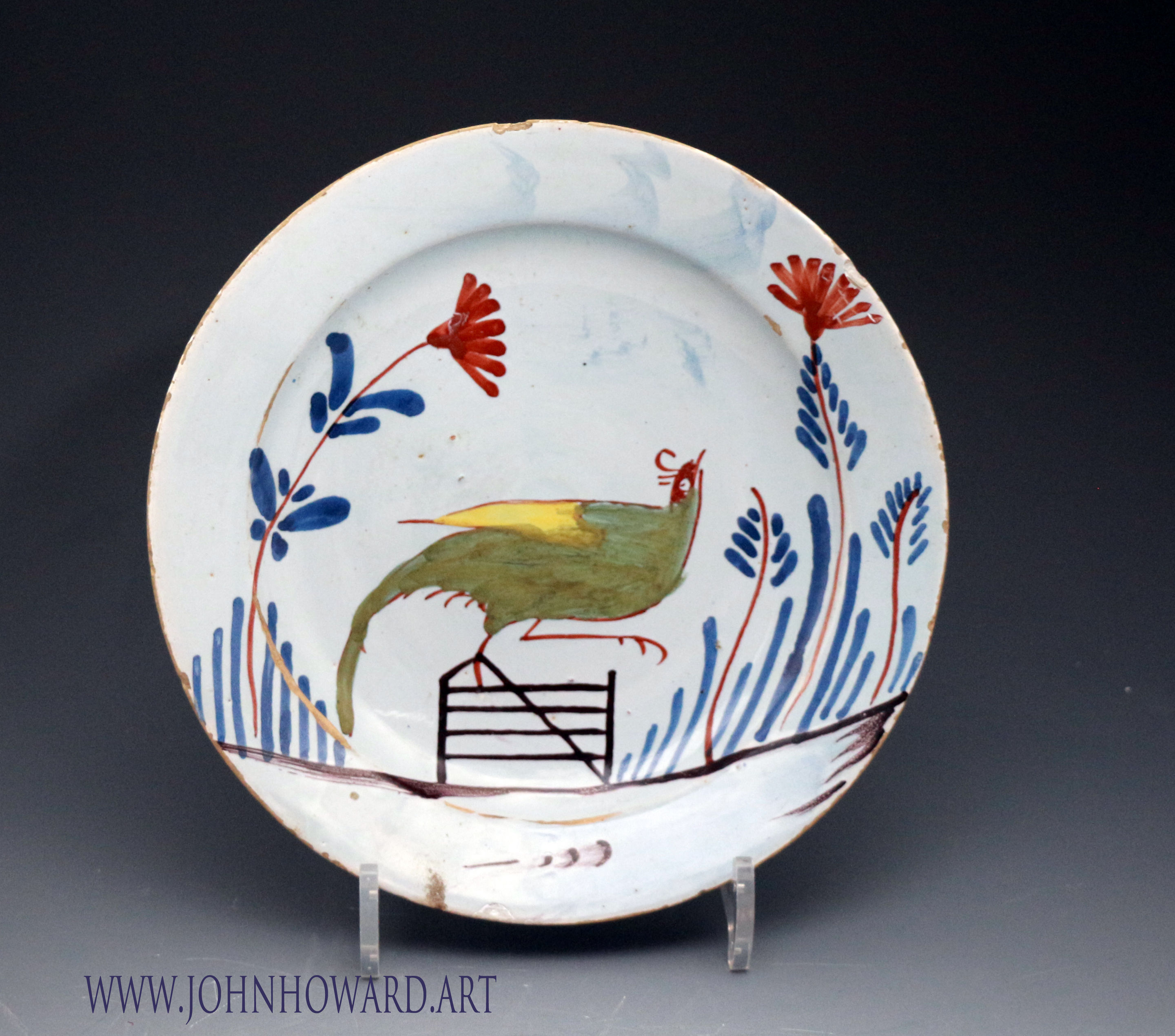 English delftware plate with pheasant perched on a gate antique period 18thc.