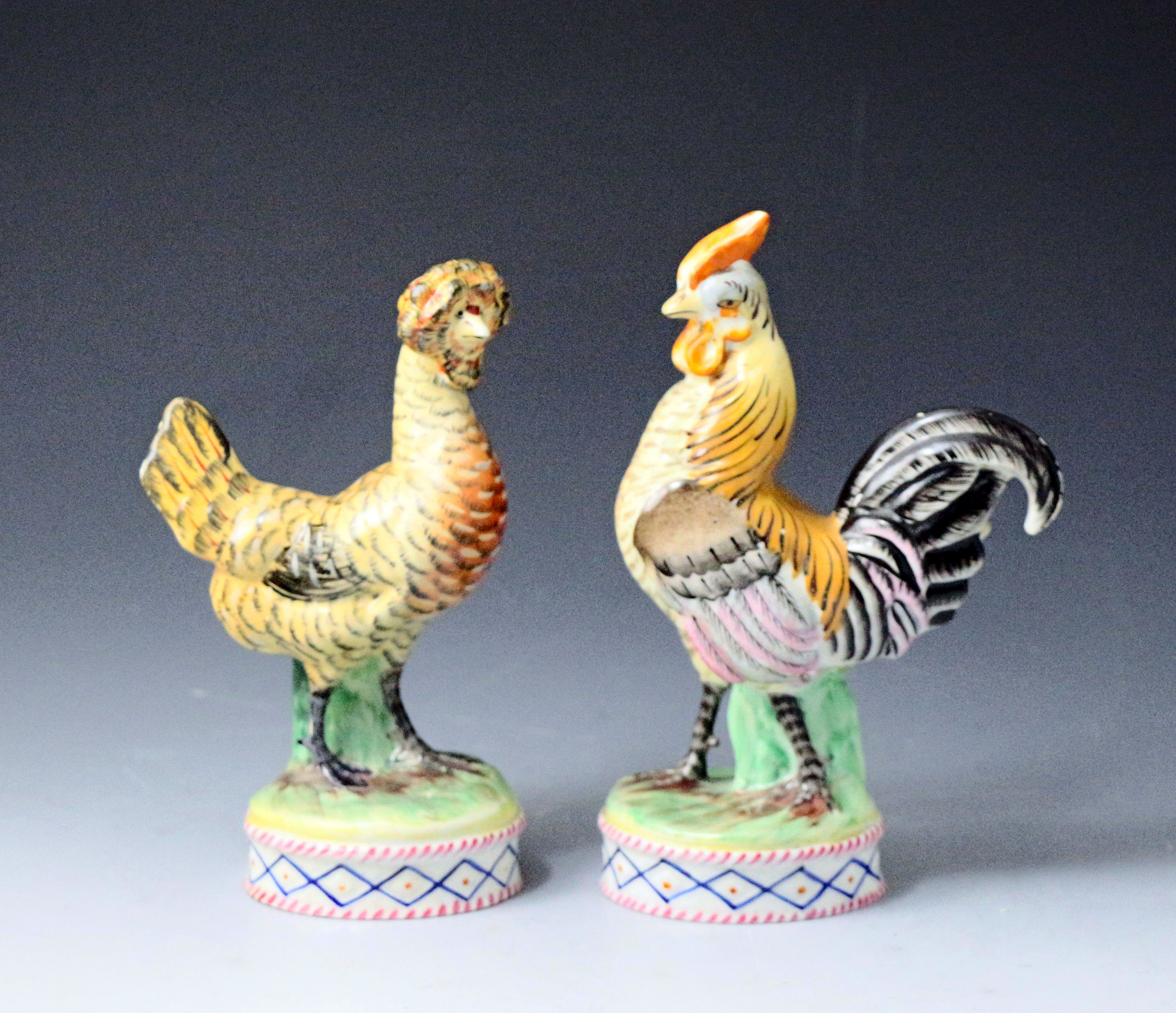 Staffordshire pottery figures of hen and rooster mid 19th century antique period.